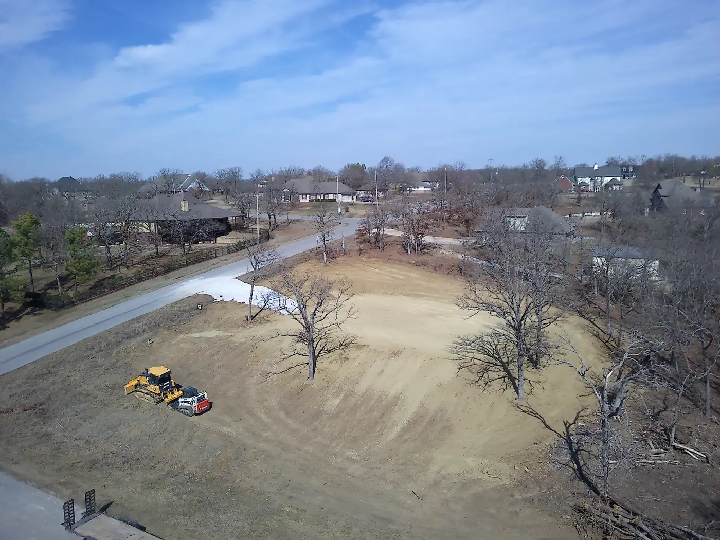 Aerial view of a large graded residential lot