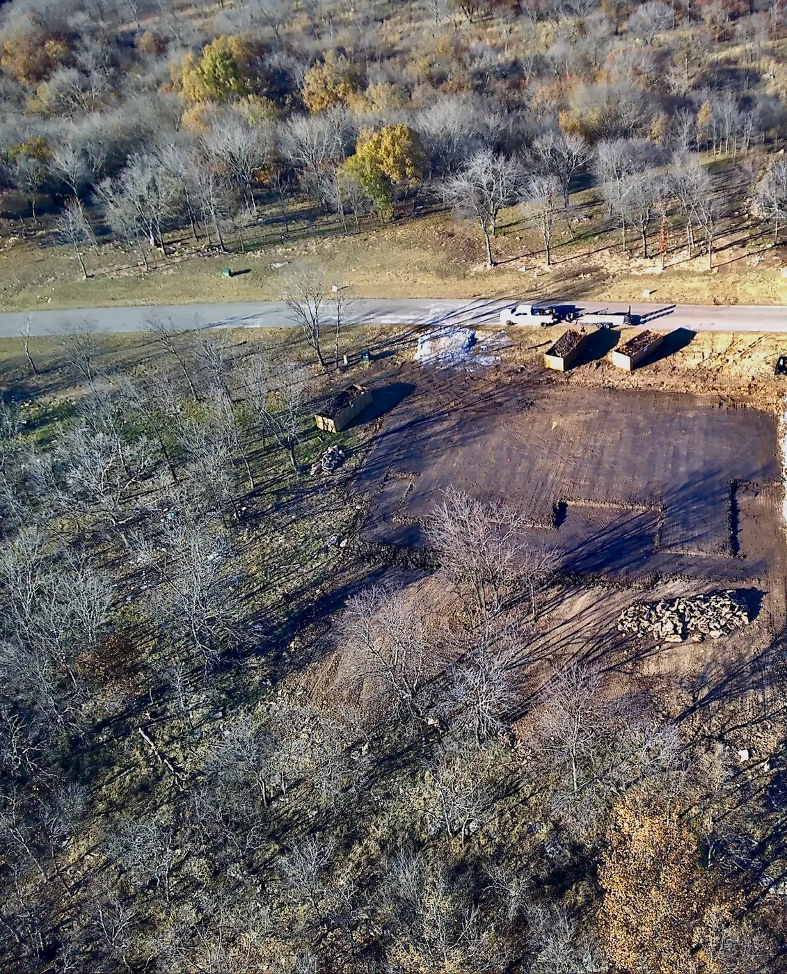 Aerial progress view of a cleared and graded wooded lot