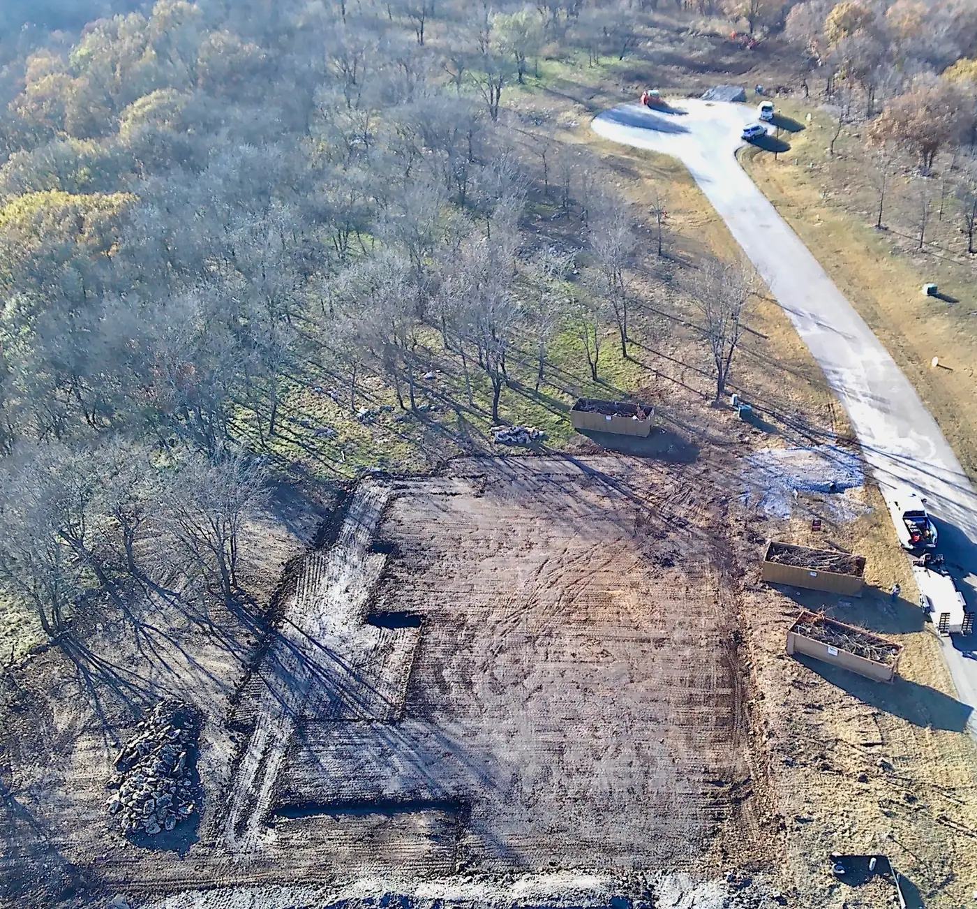 Aerial view of land clearing and site preparation progress